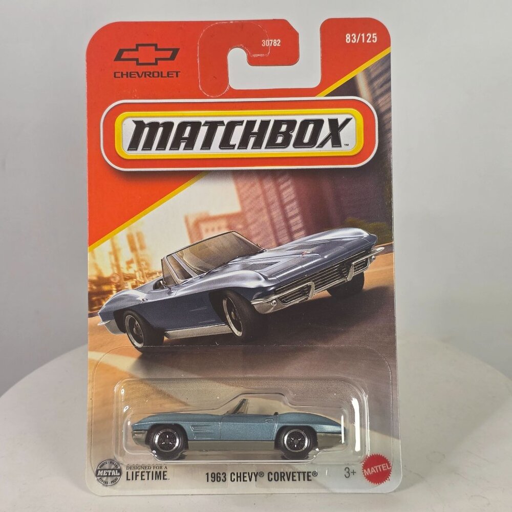 1963 Chevy Corvette Matchbox Die-Cast Car 83/125 Metallic Light Blue Mint On Car